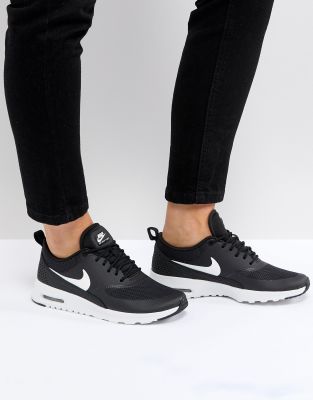 womens white and black nike trainers
