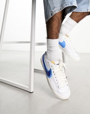 Blazer Low '77 double swoosh spray trainers in white and blue