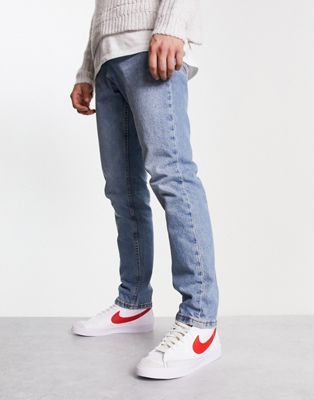 Blazer Mid '77 trainers in white with red swoosh
