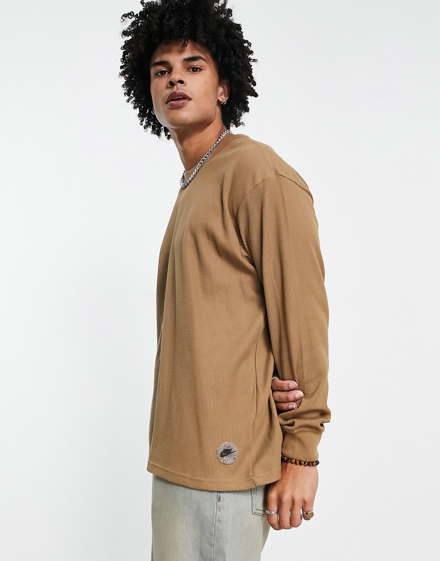 Nike Sports Utility long sleeve crew neck top in driftwood-Brown