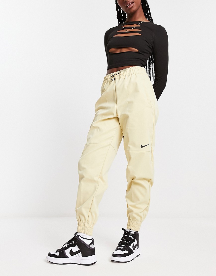 Nike Swoosh woven cargo trousers in beige-Brown