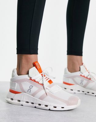 ON Cloudnova Void trainers in white and orange