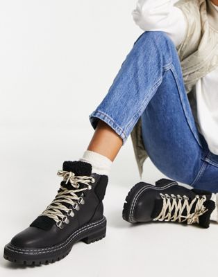 chunky lace up boot with faux fur trim in black