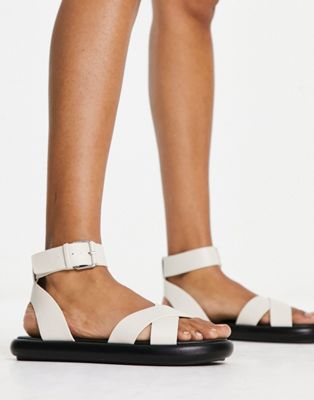 cross front buckle sandals in white