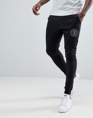 adidas originals adicolor beckenbauer joggers in skinny fit in black cw1269