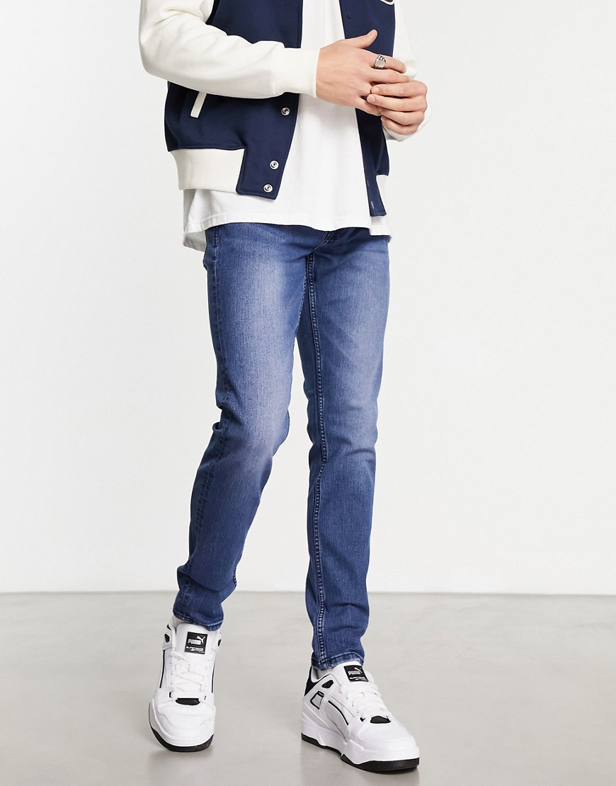 Only & Sons warp skinny fit jeans in mid blue