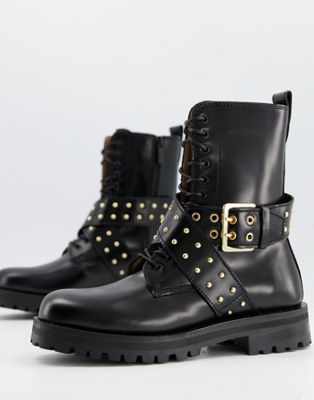 leather cross strap stud detail chunky flat boots in black