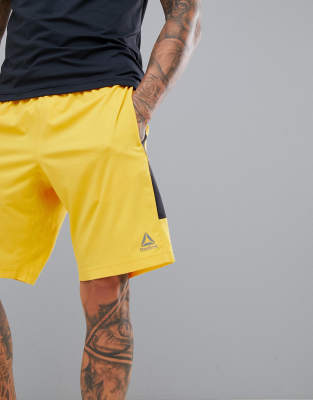 pantalones reebok amarillo