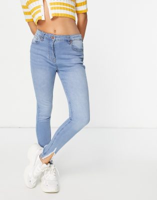 Parisian slit hem skinny jeans in light wash blue - Click1Get2 Cyber Monday