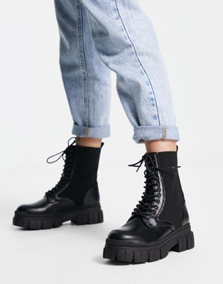 chunky sole lace up biker boot with rib in black