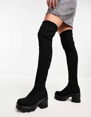 over the knee platform boots in black