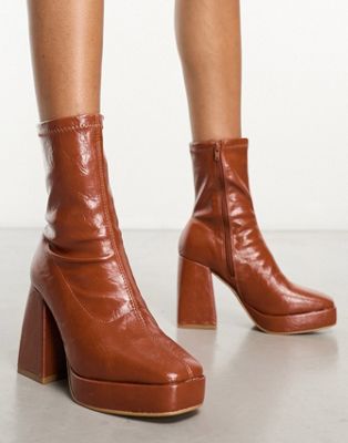 patent block heel boot in tan