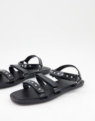 strap flat sandals with studs in black