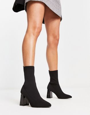 suede point toe heeled ankle boots in black