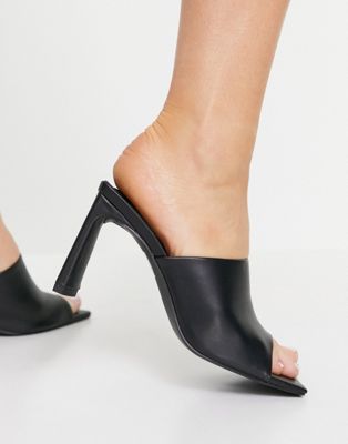 Vice heeled mule sandals in black