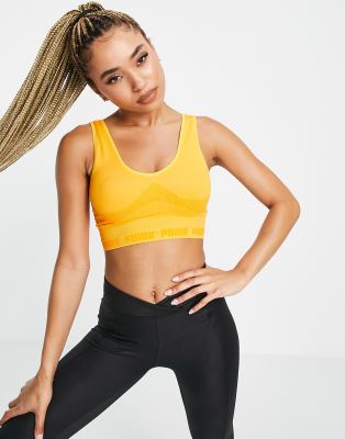 Puma Training Evostripe seamless light support sports bra in orange - Click1Get2 Half Price