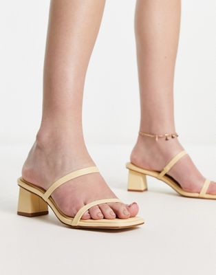 Frieda strappy mid heeled sandals in yellow