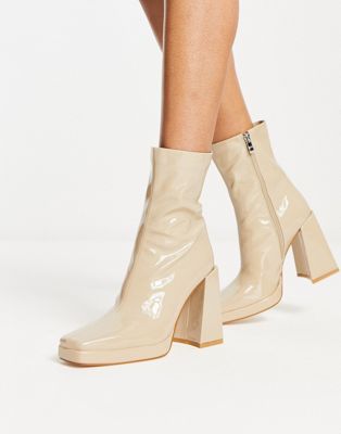 Vista heeled sock boots in ecru vinyl