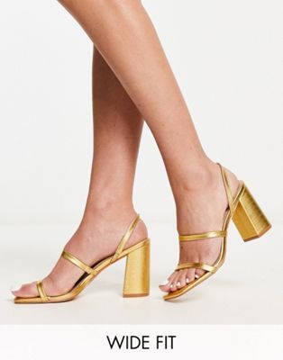 Libra block heeled sandals in gold lizard