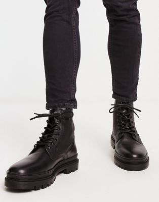 chunky sole lace up boots in black leather