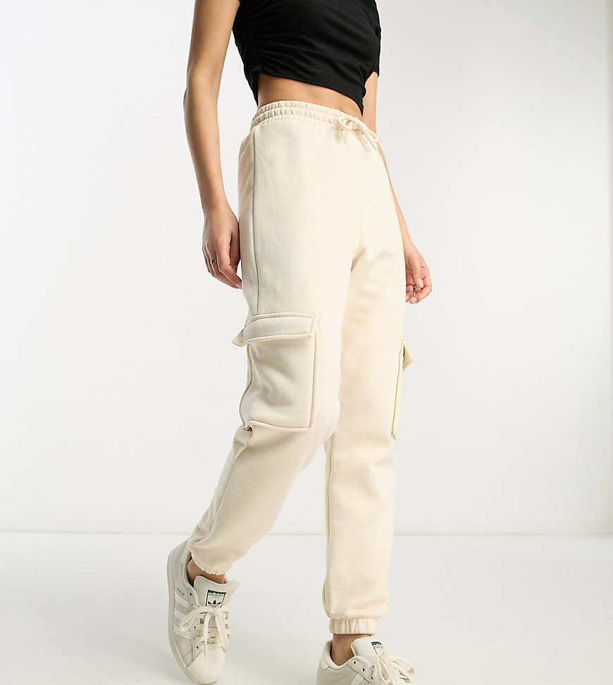 River Island Petite cargo trouser with pocket detail in beige-Neutral