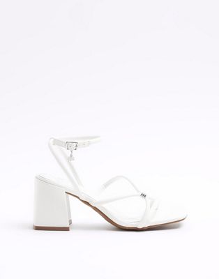 Strappy heeled sandals in white