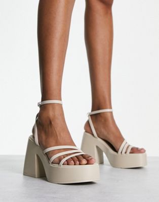 Sia platform heeled sandals in ecru