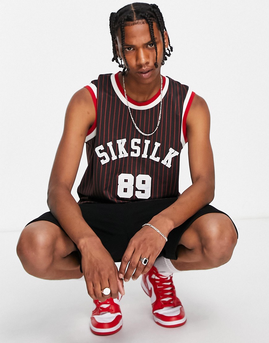 Siksilk co-ord basketball vest in black with red pinstripe and varsity print