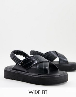 chunky flatform sandal with cross strap detail in black