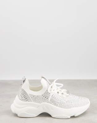 white nike trainers with green tick