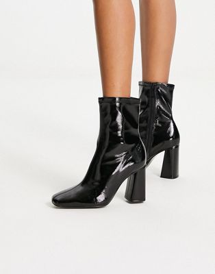 patent platform heeled boot in black
