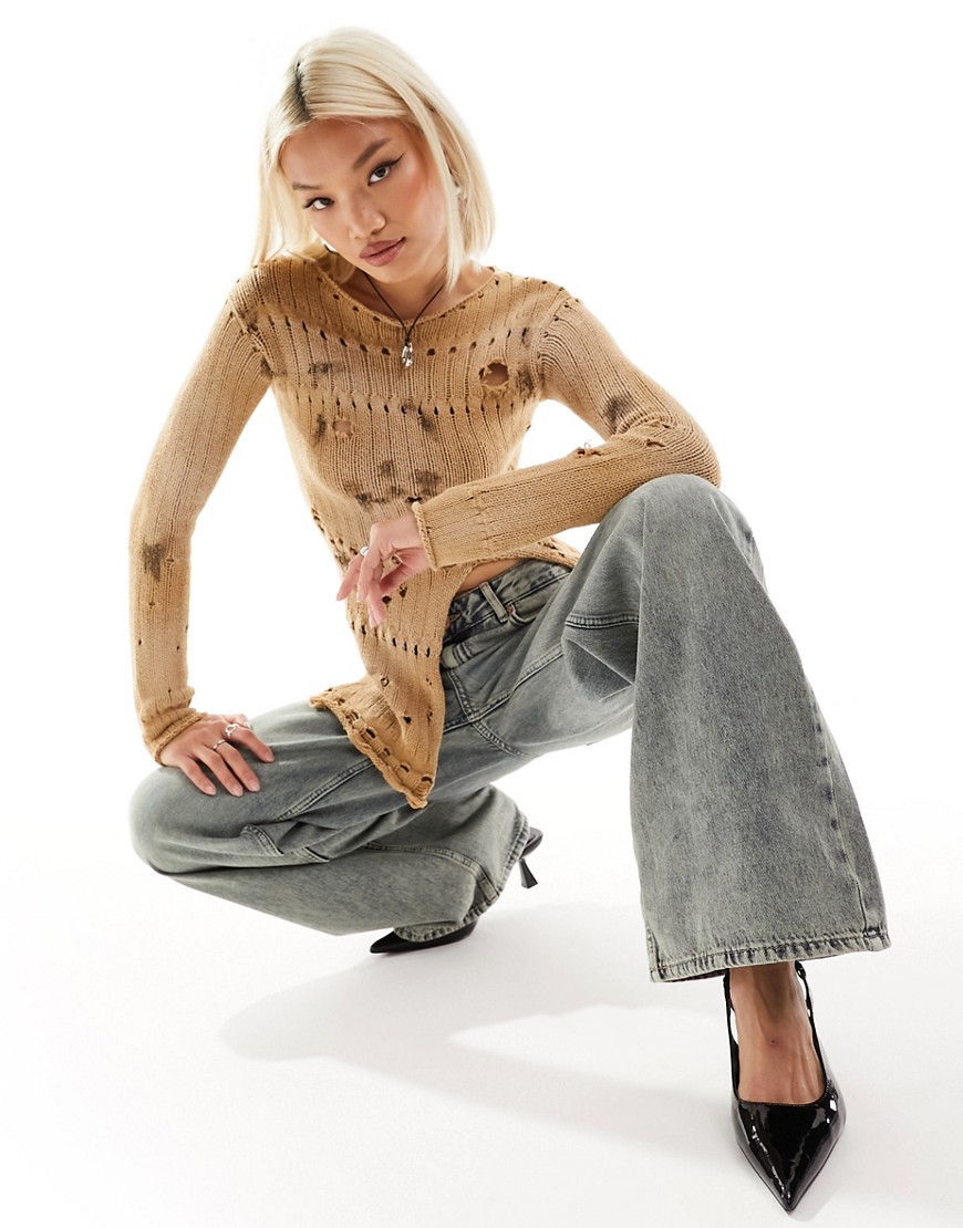 The Kript Y2K overdye knitted rib jumper with distressing and front split in brown