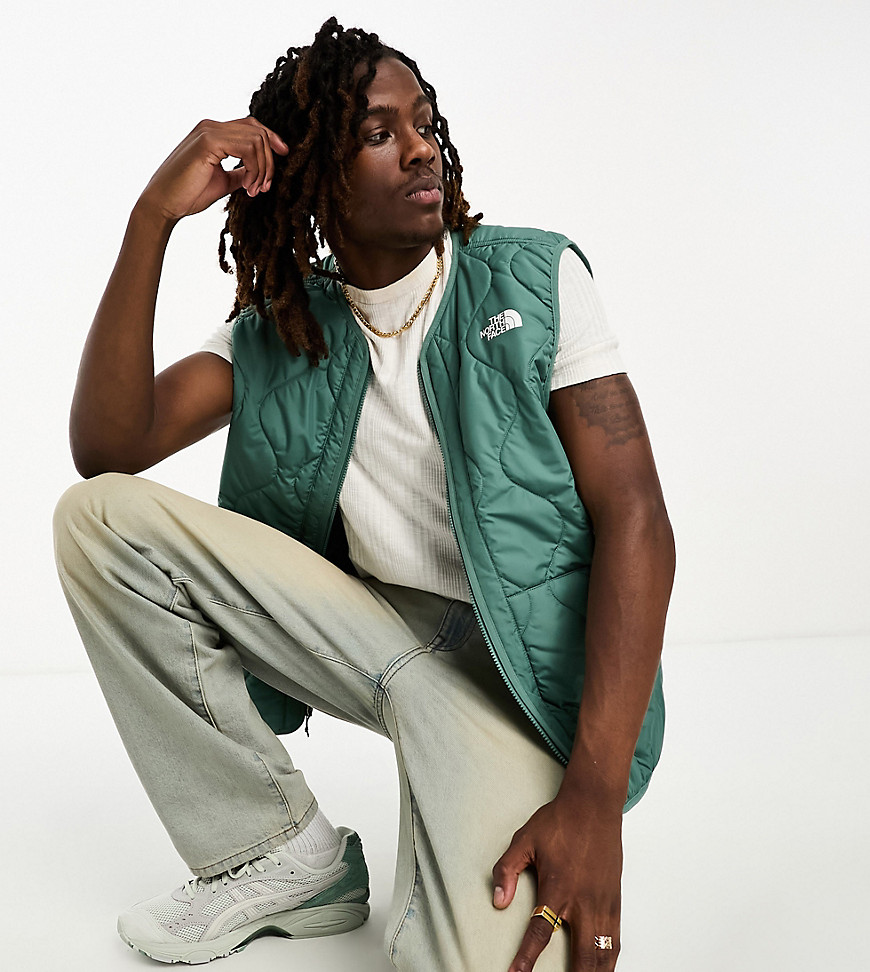 The North Face Ampato quilted zip up liner vest in green Exclusive at ASOS