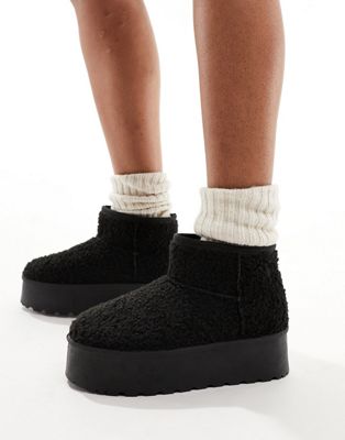 flatform ankle boots in black borg