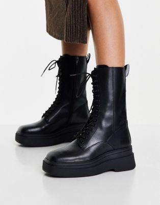 Carla lace front flatform boots in black leather