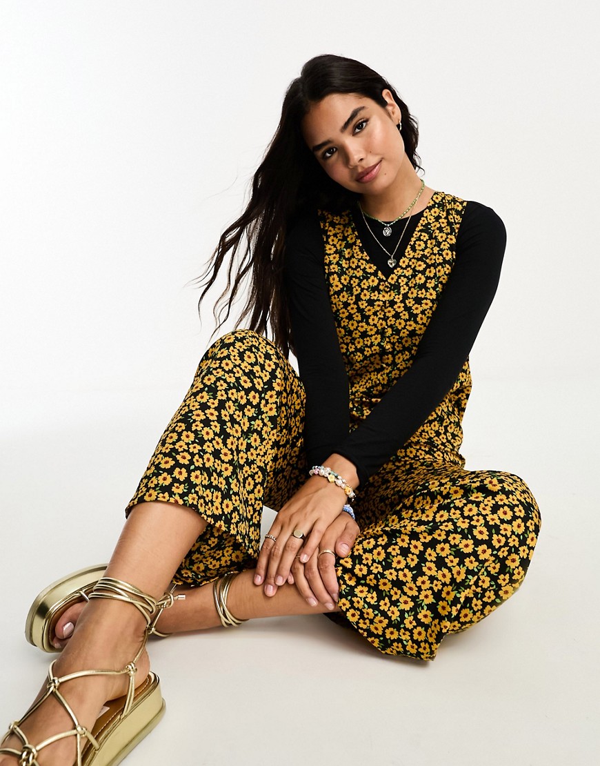 Wednesday’s Girl marigold floral overlay long sleeve jumpsuit in yellow