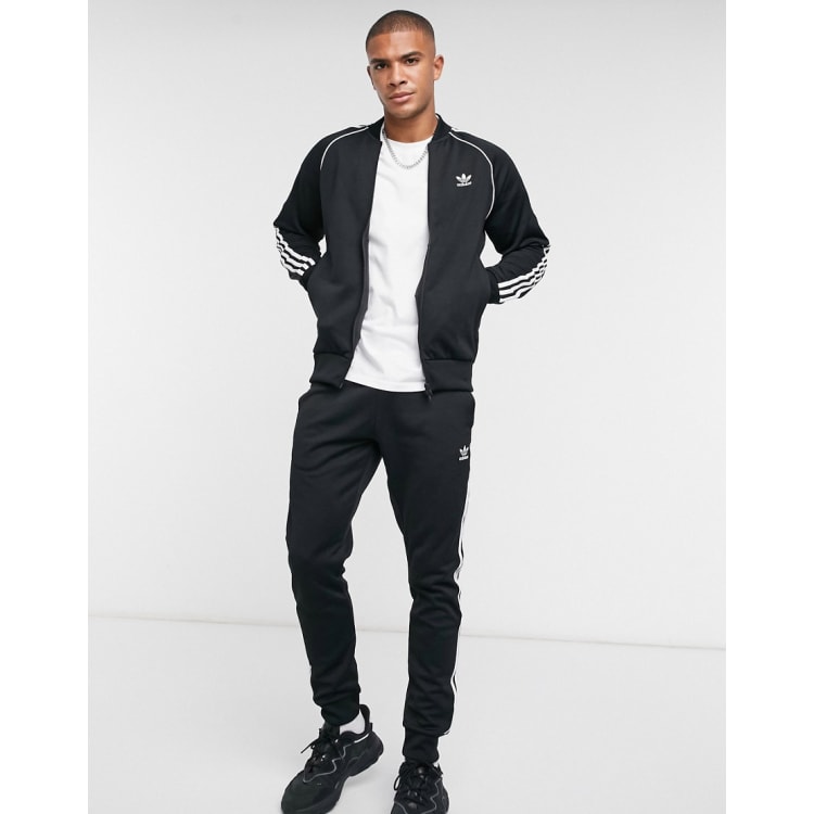 Adidas originals black store and white tracksuit