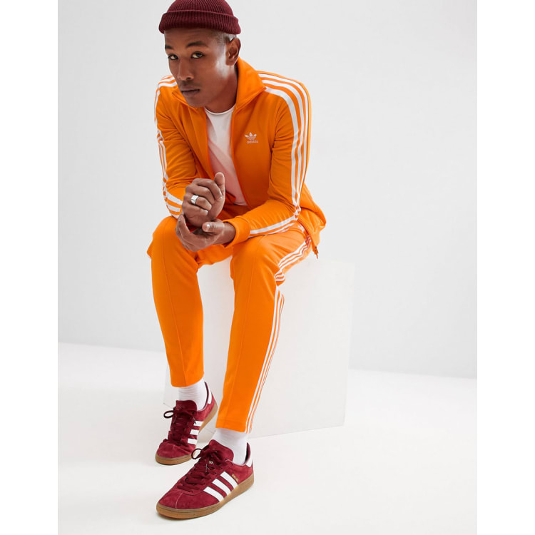 Adidas jogginganzug orange on sale