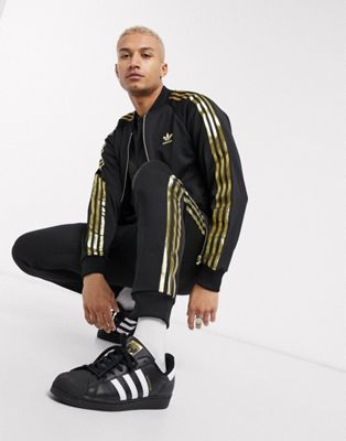 adidas black gold tracksuit