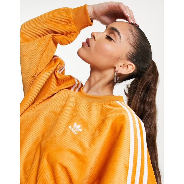 adidas Originals three stripe corduroy co-ord in orange | ASOS