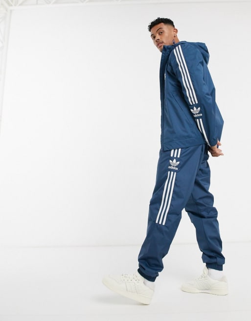 Adidas originals store tracksuit navy