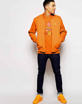 bright orange adidas tracksuit