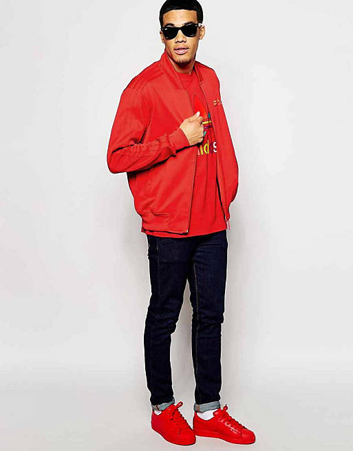 Gluren skelet Shuraba adidas Originals X Pharrell Williams - Supercolour in rood | ASOS