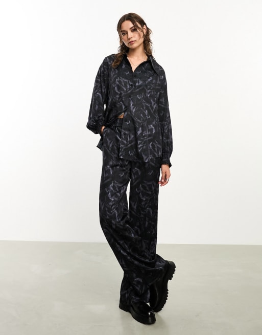 AllSaints x ASOS exclusive Charli co-ord satin shirt and trousers in black