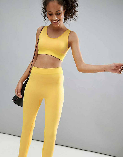 ASOS 4505 seamless sports bra & legging two-piece with leopard panels in yellow