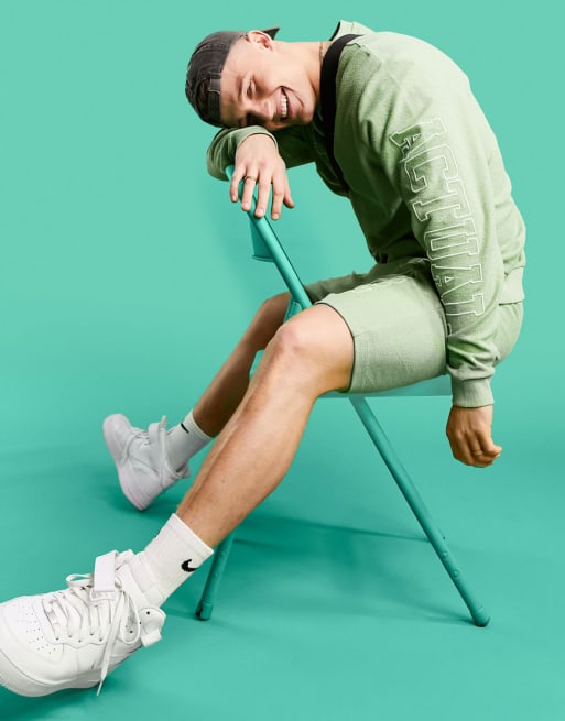 ASOS Actual set relaxed in reverse loopback with logo arm print in green