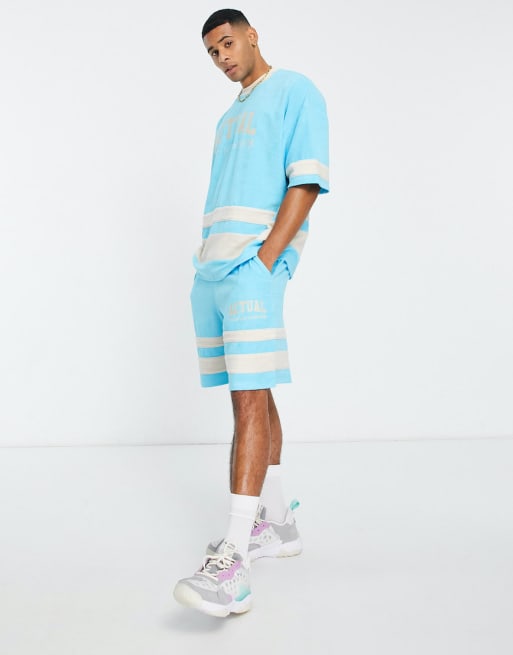 ASOS Actual set with cut and sew detailing and logo print in blue