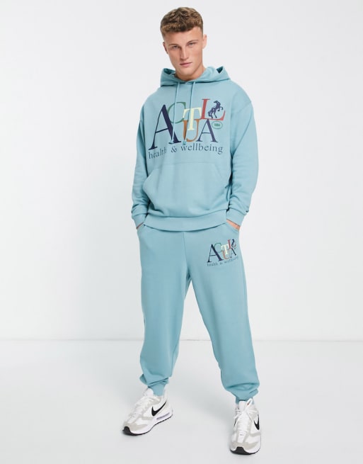 ASOS Actual set with Health and Wellbeing front logo print in light blue - LB