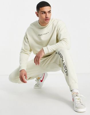ASOS Dark Future co-ord with chest print logo in off white