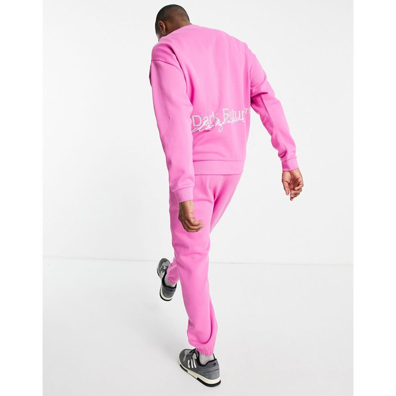 027AN Tute Dark Future - Coordinato con joggers rosa acceso con stampa del logo sul retro
